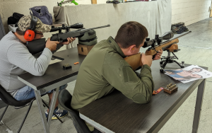 Precision shooting session focusing on firearm safety and handling