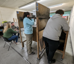 Historic rifle display with expert safety instruction