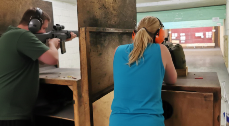 Precision shooting session focusing on firearm safety and handling